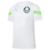 Camisa de treino branca e verde limão do Palmeiras, modelo masculino, com logo da Puma e estampa do time.