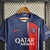 Camisa do Paris Saint-Germain I 23/24, modelo torcedor masculino da Nike, na cor azul com detalhes em vermelho e logotipo do time.

