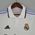 Camisa do Real Madrid Home 22/23 para torcedores masculinos, na cor branca, com detalhes em azul e logo da Adidas.

