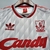 Camisa retrô cinza do Liverpool, modelo Away 89/91, com detalhes em vermelho e logo da Adidas.

