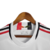 Camisa branca do São Paulo Futebol Clube, modelo 23/24, com patrocínio da Sportsbet.io e logo da Adidas.