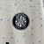 Camisa branca do Girona II 23/24, com detalhes em azul e logo da Puma