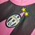 Camisa retrô rosa da Juventus II 2011/2012, com detalhes em preto e logo da Nike.

