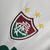 Camisa retrô branca do Fluminense II 2010, com detalhes em verde e vermelho, da Adidas, com logo da Unimed.