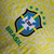 Camisa amarela da Seleção Brasileira I 24/25, com detalhes em verde e logo da CBF