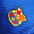 Camisa de treino azul do Barcelona 23/24, com logo da Nike e patrocínio da Spotify.

