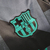 Camisa de treino do Barcelona 23/24, cinza com detalhes em preto e logo da Nike.

