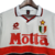 Camisa retrô branca do AC Milan II 93/94, da marca Lotto, com detalhes em vermelho e logotipo da equipe.

