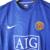 Camisa retrô do Manchester United 2007/2008 na cor azul, fabricada pela Nike, com logo do time e patrocínio AIG.

