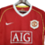 Camisa retrô vermelha do Manchester United da temporada 2006/2007, com logo da Nike e patrocínio AIG.

