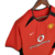 Camisa retrô do Manchester United 2002/2004 na cor vermelha, com logo da Nike e patrocinador Vodafone.

