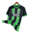 Camisa de futebol masculina da Nike, modelo Brigthon Away 23/24, nas cores verde e preto, com detalhes em listras verticais e logo da American Express.

