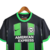 Camisa de futebol masculina da Nike, modelo Brigthon Away 23/24, nas cores verde e preto, com detalhes em listras verticais e logo da American Express.

