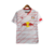 Camisa branca do Red Bull Bragantino com detalhes em vermelho e logo da New Balance.