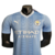 Camisa masculina do Manchester City I 23/24, modelo jogador, cor azul, fabricada pela Puma.