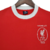 Camisa retrô vermelha do Liverpool de 1965 com gola e punhos brancos

