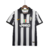 Camisa retrô da Juventus I 2014/2015 da Nike, preta e branca, com detalhes em amarelo e logo da marca