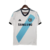 Camisa retrô branca do Chelsea da temporada 2012/2013, com detalhes em azul e logo da Adidas.