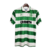 Camisa retrô do Celtic de 1987/1989, em verde e branco, com listras horizontais e logo da Umbro.