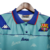 Camisa retrô do Barcelona de 1992/1995, na cor azul, com detalhes em vermelho e logo da Kappa.

