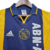 Camisa retrô do Ajax, temporada 2000/2001, nas cores azul e amarela, com logo da Adidas e patrocínio ABN AMRO.

