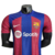 Camisa do Barcelona I 23/24 Jogador Nike Masculina nas cores azul e grená, com logo da Nike e Spotify.

