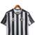 Camisa retrô do Botafogo, preta e branca, com listras verticais e logotipo da Topper.