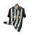 Camisa retrô do Atlético Mineiro temporada 16/17, com listras pretas e brancas e patrocínio da Caixa Econômica.

