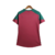 Camisa feminina do Fluminense, modelo de treino, com detalhes em verde e vermelho.