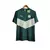 Camisa de treino verde do Palmeiras 22/23, com detalhe em branco e logo da Puma.