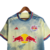 Camisa de futebol amarela do New York Red Bull, edição especial New Cow Stadium 23/24, com detalhes em azul e vermelho e logo da equipe.

