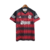 Camisa do Flamengo I 23/24 masculina, vermelha e preta, com detalhes em preto e logo do clube.