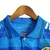 Camisa polo masculina azul da seleção brasileira 22/23, com detalhes em branco e todos os patrocínios visíveis.

