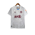 Camisa branca do Aston Villa II 23/24, com detalhes em vermelho e logotipo da Castore.