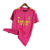 Camisa rosa do goleiro do Real Madrid 23/24 com detalhes em amarelo e logo da Adidas

