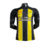 Camisa do Al-Ittihad I 23/24, masculina, preta com detalhes em amarelo e branco, da Nike.