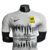 Camisa Al-Ittihad III 23/24 branca com detalhes em preto e amarelo, modelo masculino da Nike, com estampas na parte frontal.

