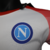 Camisa branca do Napoli, edição especial dia dos namorados 23/24, com detalhes em vermelho e logo da EA7.

