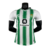 Camisa do Real Betis I 23/24, masculina, verde com detalhes em branco, modelo Hummel, vista frontal.