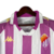 Camisa branca do Real Valladolid com detalhes em roxo, fabricada pela Kappa, modelo torcedor 23/24.

