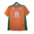 Camisa laranja do Real Bétis II 22/23, com detalhes em verde e logo da Hummel.