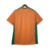 Camisa laranja do Real Bétis II 22/23, com detalhes em verde e logo da Hummel.

