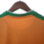 Camisa laranja do Real Bétis II 22/23, com detalhes em verde e logo da Hummel.

