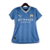 Camisa feminina do Manchester City, azul com detalhes em branco, fabricada pela Puma, temporada 2023/2024.