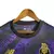 Camisa do Porto Edição Especial 22/23 na cor preta com detalhes em roxo e dourado, fabricada pela New Balance.

