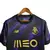 Camisa do Porto Edição Especial 22/23 na cor preta com detalhes em roxo e dourado, fabricada pela New Balance.

