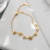 Pulseira Margaridas Banhada em Ouro 18k - comprar online