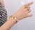 Bracelete com Pingente Banhado em Ouro 18k na internet