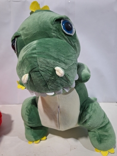 PELUCHE DINO CON MANTA - El Principito Mayorista