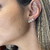 Brinco ear cuff 3 flores cravejadas com cristais de zircônia (banho ouro 18K 750) na internet